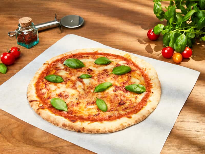 Pizza au four à bois pour 8 personnes - Recettes - Elle à Table